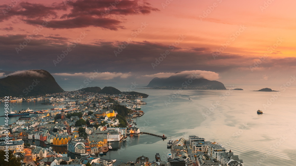 Alesund, Norway. Day To Night Time-lapse. Dramatic Sky In Warm Colours Above Alesunds Islands In Sunset Time. 4K. Famous Town In Evening Night Time
