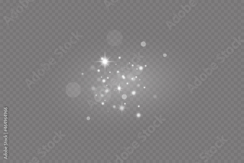 Dust sparks and stars shine with a special light. Christmas light effect. Glittering particles of magic dust.Vector sparkles on a transparent background.