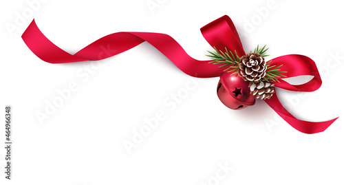 Decorative red bow, bell and pine cones with swirled ribbon and pine branches isolated on white background. Christmas and New Year decoration corner and frame element for your design