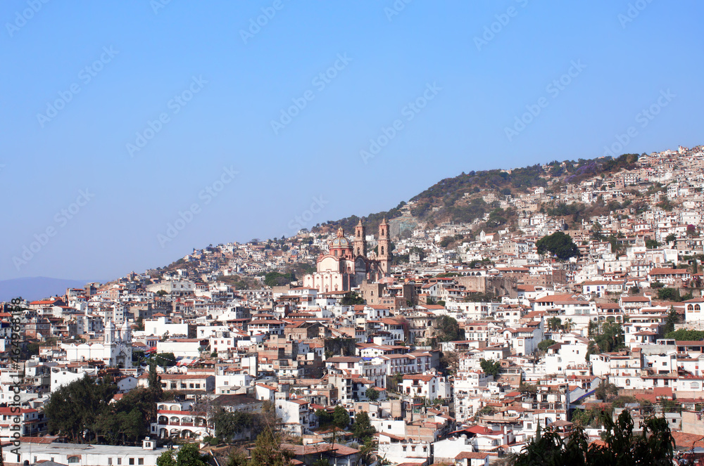 View on Taxco de Alarcon city and Santa Prisca Parish Church, Mexico
