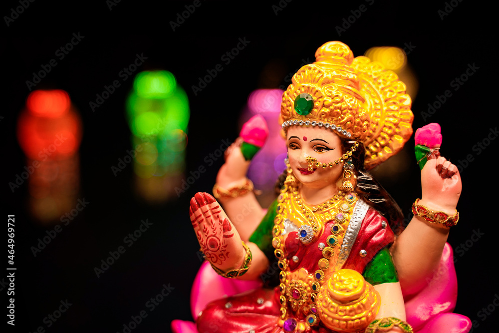 Beautiful Clay Idol of Hindu Goddess Lakshmi for diwali festival. Beautiful Clay Idol of Hindu Goddess Lakshmi for diwali festival.