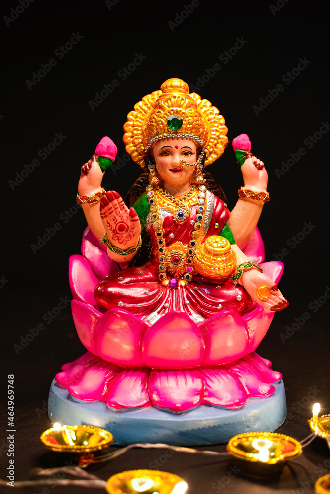 Beautiful Clay Idol of Hindu Goddess Lakshmi for diwali festival. Beautiful Clay Idol of Hindu Goddess Lakshmi for diwali festival.