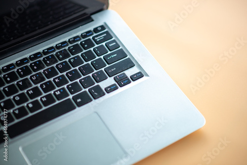 close-up photo of a laptop keyboard, copy space.