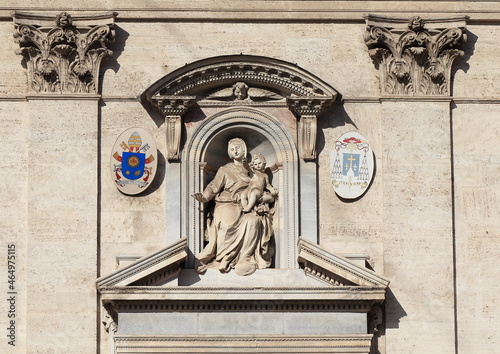 Santa Maria in Traspontina Facade Detail with Statue of Madonna with Child in Via della Conciliazione Street in Rome, Italy photo