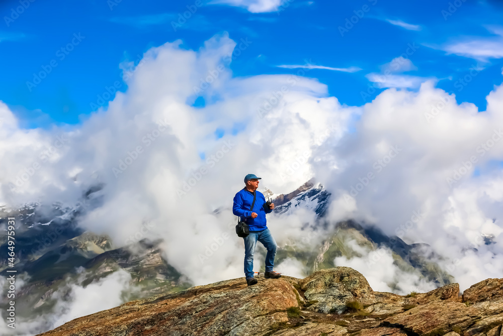 Drone operator in snow Alps mountain range
Drone operator in snow Alps mountain range