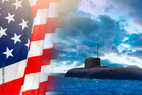 Submarine USA. Submarines USA. US Navy. American naval weapons. Nuclear submarine surfaced by United States of America. US flag next to subboat. Subboat has partially surfaced at sea.