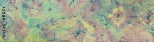 colorful cashmere scarf hand-coloured in Tie-dye batik technique photo