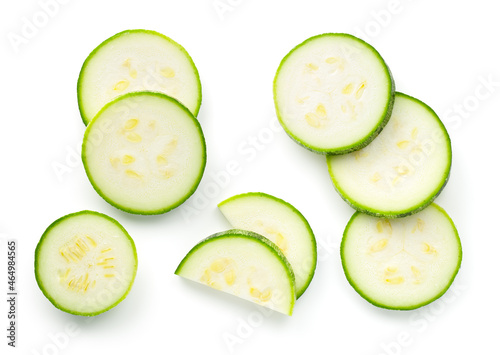 Pieces Of Sliced Zucchini Isolated Over White