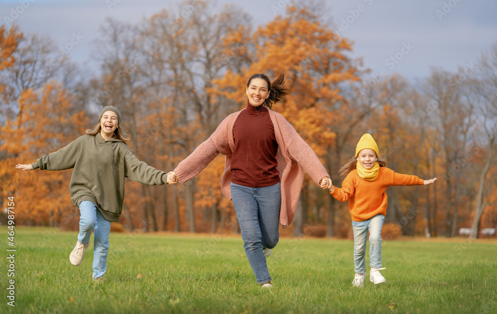 Fototapeta premium Happy family on autumn walk
