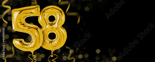 Golden balloons with copy space - Number 58 photo