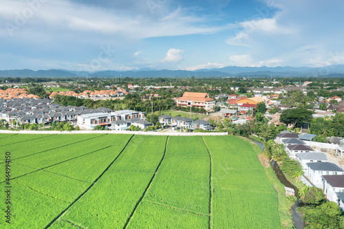 Land and housing estate in aerial view. May call residential building, village, community. Real estate or property from subdivision, construction, development for sale, buy and mortgage in Chiang Mai.