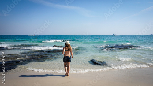 Girl on the sea back view on the island of Samet Thailand