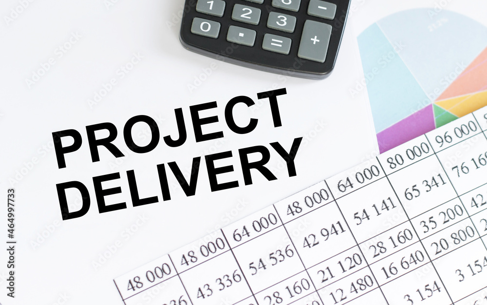 notepad with text PROJECT DELIVERY. White background. Business notepad with text PROJECT DELIVERY. White background. Business