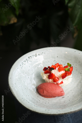 Strawberry ice cream with whipped cream