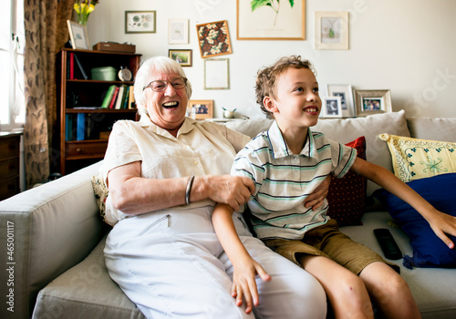 Grandma and grandson sitting on the sofa together