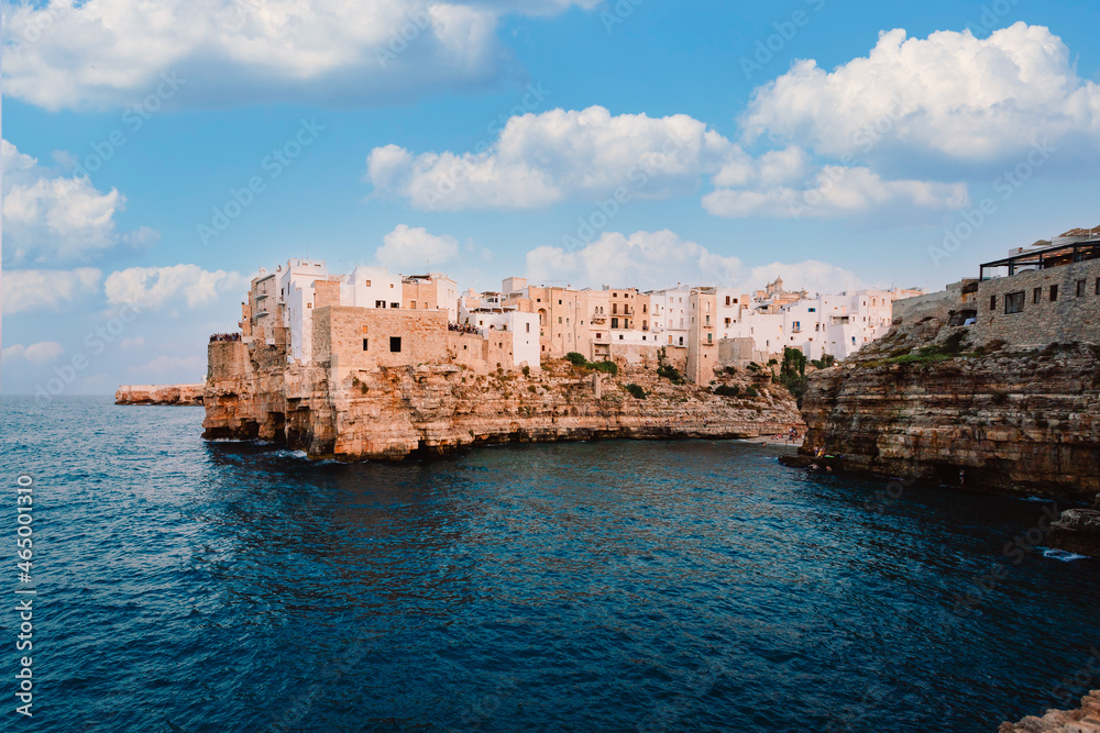 View from the panoramic terrace of Polignano a Mare of the Apulian village in the province of Bari, sky with white clouds