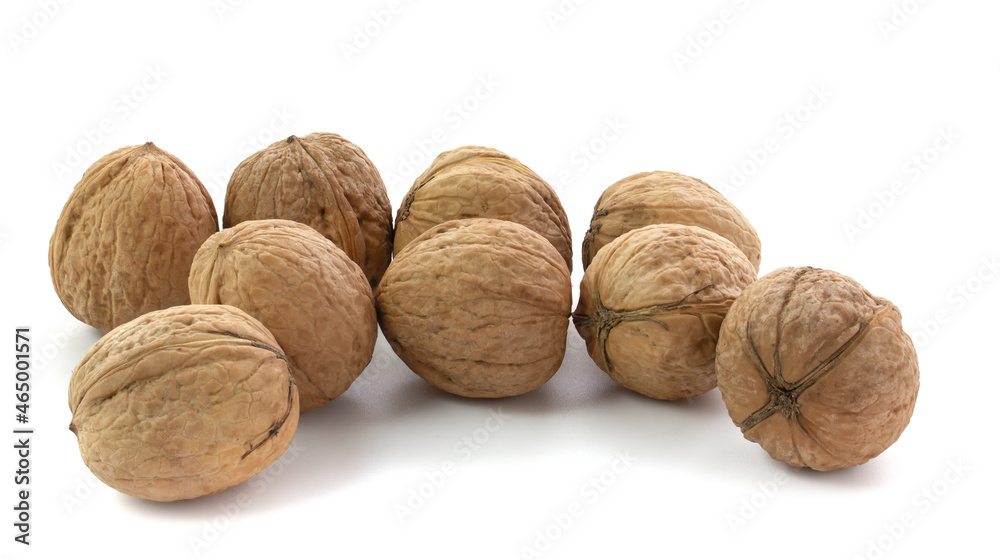 Several walnuts isolated on white background close-up Several walnuts isolated on white background close-up
