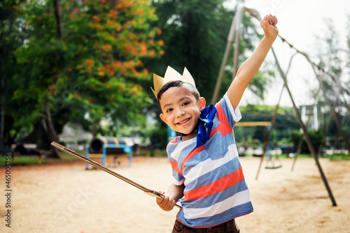 Принти на полотні Boy playing king at a playground
