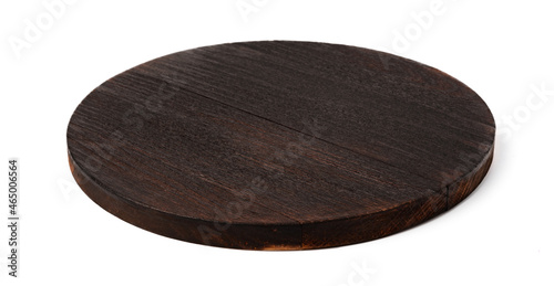 Dark wooden cutting board on white background