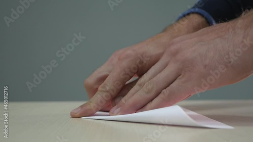 making a paper boat. time lapse