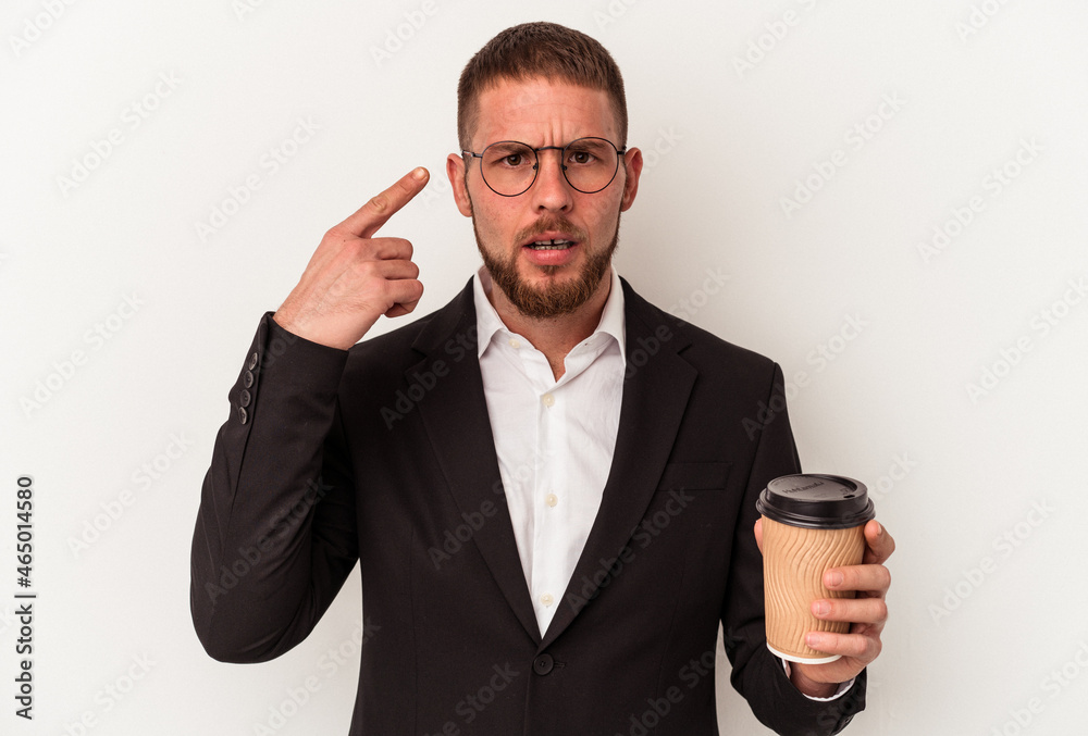 Young business caucasian man holding take away coffee isolated on white background showing a disappointment gesture with forefinger. Young business caucasian man holding take away coffee isolated on white background showing a disappointment gesture with forefinger.