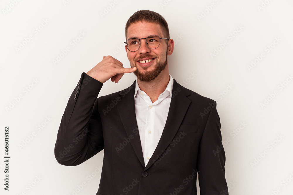 Young business caucasian man isolated on white background showing a mobile phone call gesture with fingers. Young business caucasian man isolated on white background showing a mobile phone call gesture with fingers.