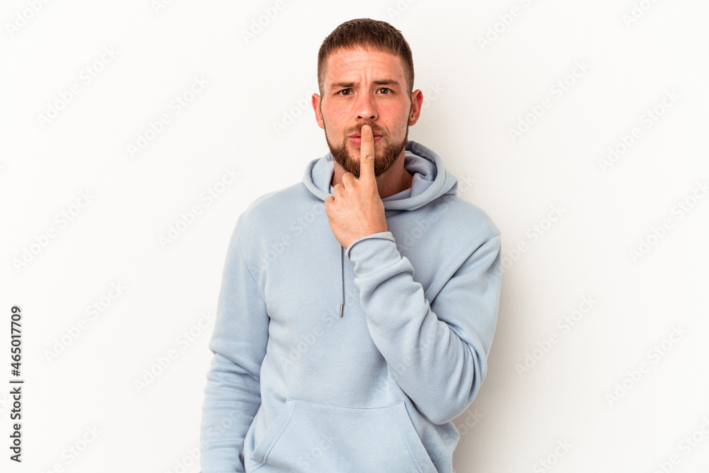 Young caucasian man with diastema isolated on white background thinking and looking up, being reflective, contemplating, having a fantasy. Young caucasian man with diastema isolated on white background thinking and looking up, being reflective, contemplating, having a fantasy.