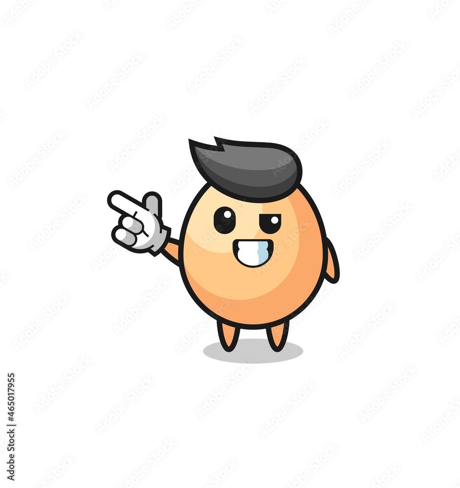 egg mascot pointing top left