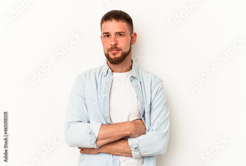 Young caucasian man with diastema isolated on white background unhappy looking in camera with sarcastic expression.