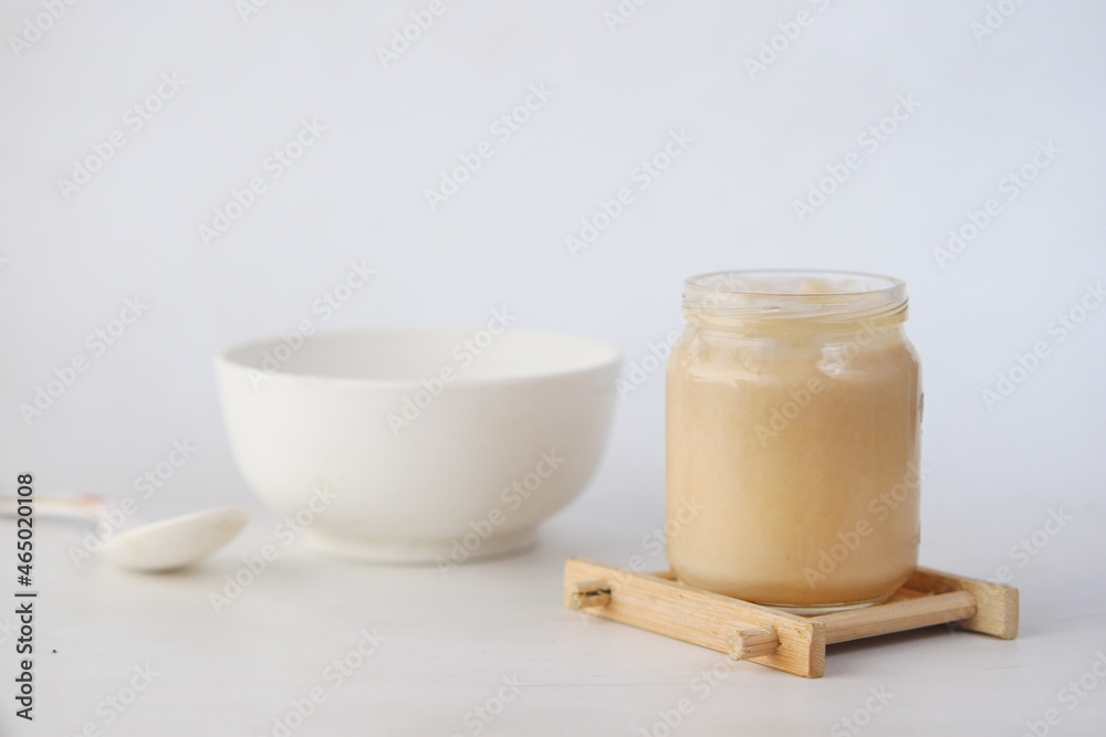 baby food in a container on table with copy space. baby food in a container on table with copy space.
