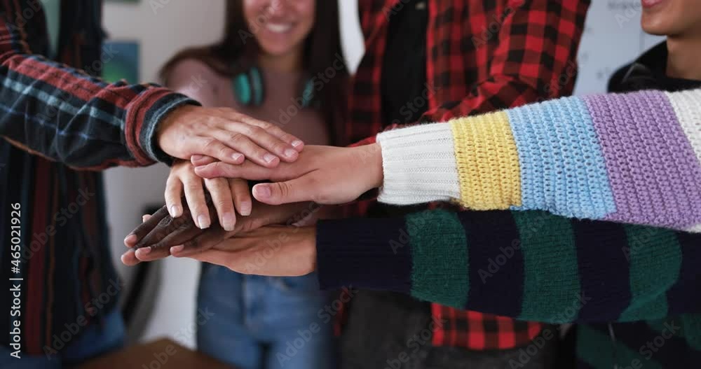 Young people stacking hands together - Diverse culture students celebrating together - Youth lifestyle and school concept