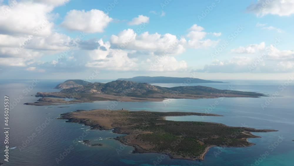 View from above, stunning aerial view the Asinara Island bathed by a turquoise water. Asinara is a small, uninhabited island that sits off the northwestern coast of Sardinia, Italy. View from above, stunning aerial view the Asinara Island bathed by a turquoise water. Asinara is a small, uninhabited island that sits off the northwestern coast of Sardinia, Italy.
