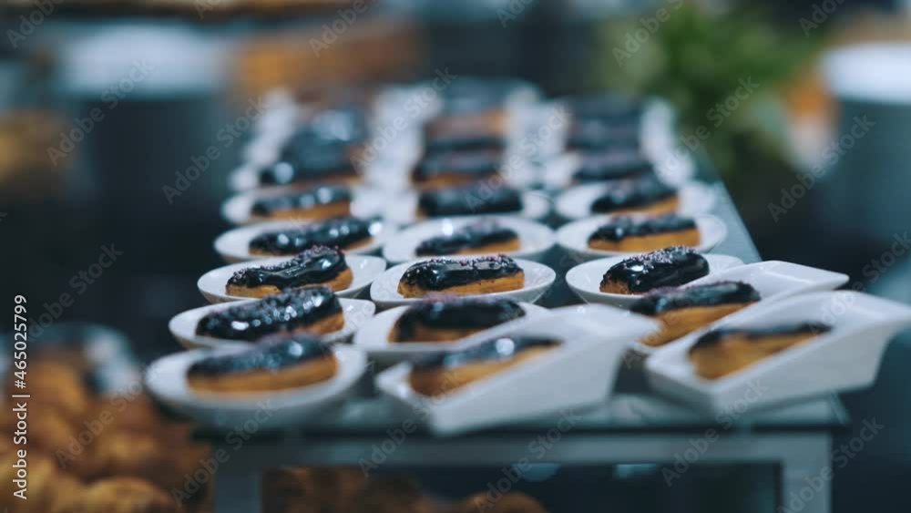 Chocolate eclairs on the buffet at the hotel