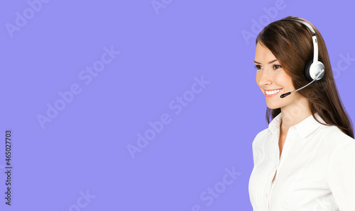 Call Center Service. Profile face portrait image of customer support or answer worker, sales agent. Caller, receptionist phone female operator. Helpline answering and telemarketing. Violet color back
