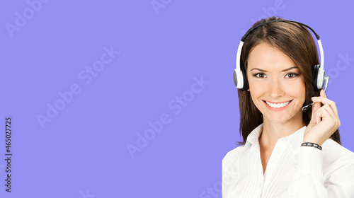 Call Center Service. Face portrait image of customer support or answer worker, sales agent. Caller, receptionist phone female operator. Helpline answering and telemarketing. Violet purple background.