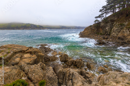 The Gamow Peninsula in the Primorsky Territory in the Far East. Coast of the Far Eastern Marine Reserve. Rocky coast.