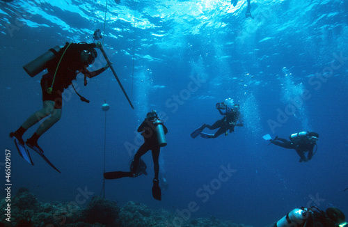 Divers on a Safety Stop Near their Dive Boat and the Safety Down Line © Gary Peplow