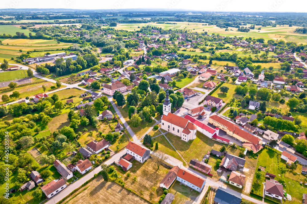Village of Legrad church and green landscape aerial view