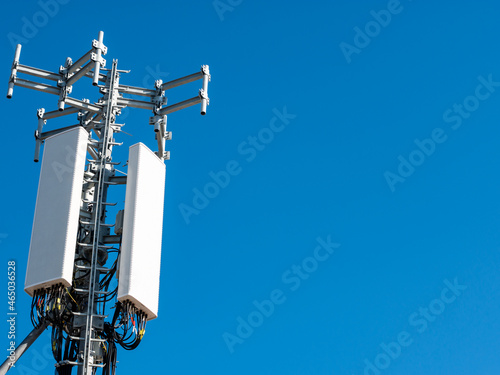 Telecommunications tower, 5g antenna and blue sky
