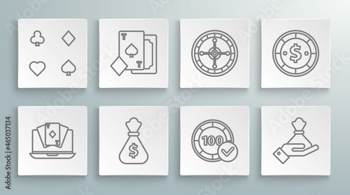 Set line Online poker table game, Playing card with spades, Money bag, Casino chips, Hand holding money, roulette wheel, dollar and cards icon. Vector