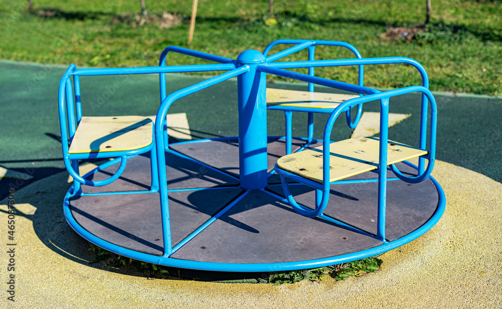 Children's swing in the open air. Playground for children's games. Children's swing in the open air. Playground for children's games.