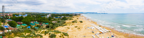 A picturesque panorama of the sea coast with a sandy beach in a resort near the city of Anapa and the village of Vityazevo © miklyxa