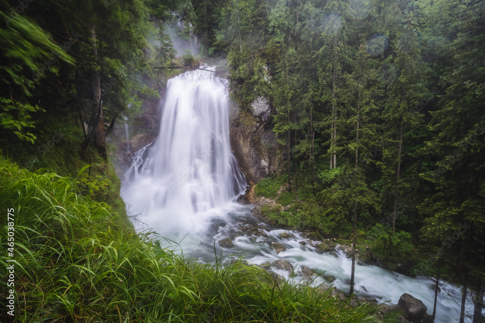 The Gollinger waterfall in Austria on rainy day