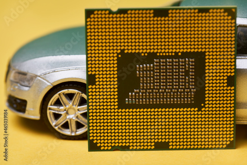 фотографія CPU chip and semiconductors with car toy