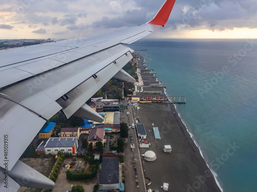 Sochi, RUSSIA, on October 18, 2021. View from the window of landing aircraft at the international airport to Adler