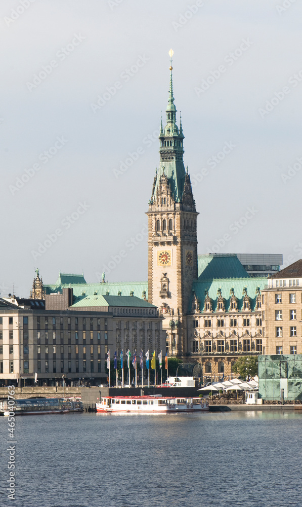 In the foreground the Alster Lake in the background the town hall of Hamburg. Germany, Europe