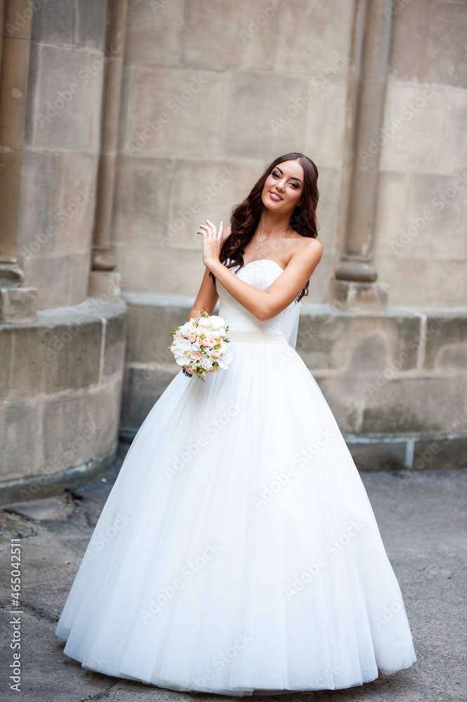 Fashion bride white wedding dress in the old city Fashion bride white wedding dress in the old city