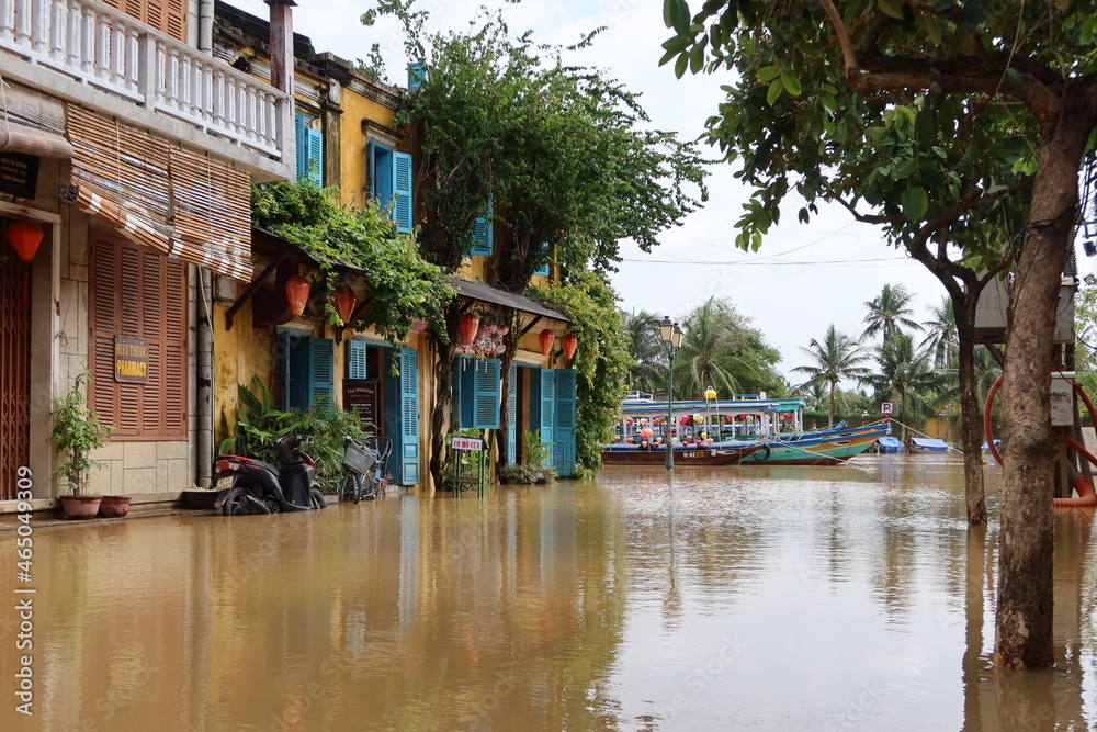 Hoi An, Vietnam, October 25, 2021: Street in downtown Hoi An, Vietnam along the Thu Bon River flooded during the 2021 rainy season