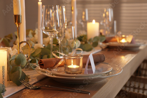 Festive table setting with beautiful tableware and decor indoors