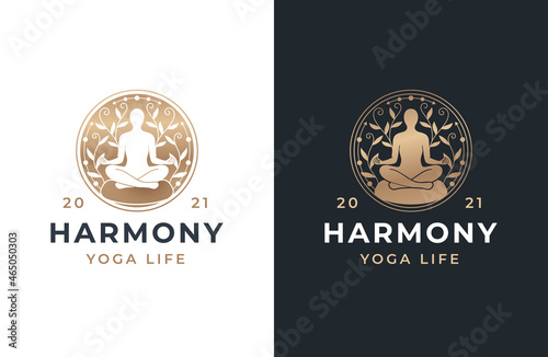 silhouette of a meditation person sitting on a rock logo design
